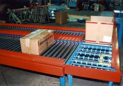 Here one package has left the transfer table while another waits to enter.