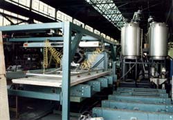 The Board Transfer Unit is uses on ridged skin, insulated, foam core panel production lines. Click to enlarge.