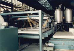 The Board Transfer Unit is intended to support the Board Feeder on ridged skin, foam core panel production lines. Click to enlarge.