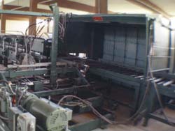 The Fume Removal Booth covers the foam dispensing area. Click to enlarge.