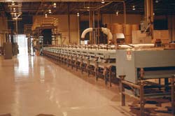 This Process Tunnel machine can produce urethane, isocyanurate, and phenolic foam core panels from .1" to 6".