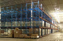 This warehouse uses pallet flow rack that is 30 rows across, 3 levels high, and 80 feet deep.