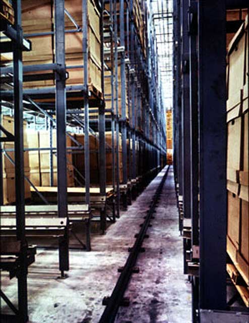 Here the pallets are loaded into the warehouse racks by the automated storage and retrieval system or ASRS.