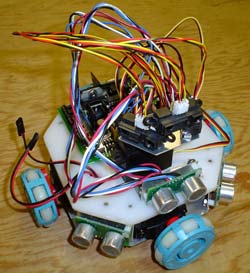 This robot uses a plastic spindle that attaches to the Transwheel.