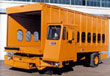 Karry-All is designed around airline cargo handling concepts with unprecedented speed and economy in inter-facility material handling.
