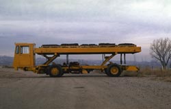 The Karry-All low-lift cargo truck is an automated cargo system that can transport 7 1/2-tons loads.