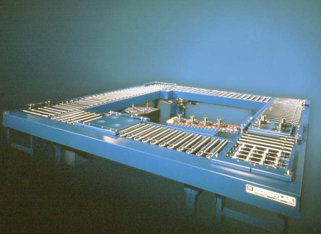 This is a powered TS Live Roller Conveyor with Transwheel� powered transfer used with robots.