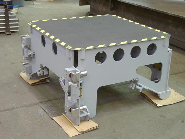 This is a vertical platform lift for a ship.