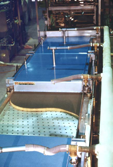 With the top removed, you can clearly see the air vents that provide heated air for higher quality reinforced foam core panel production.