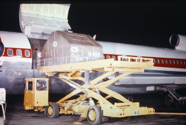 This high-lift truck is loading an air cargo pallet.